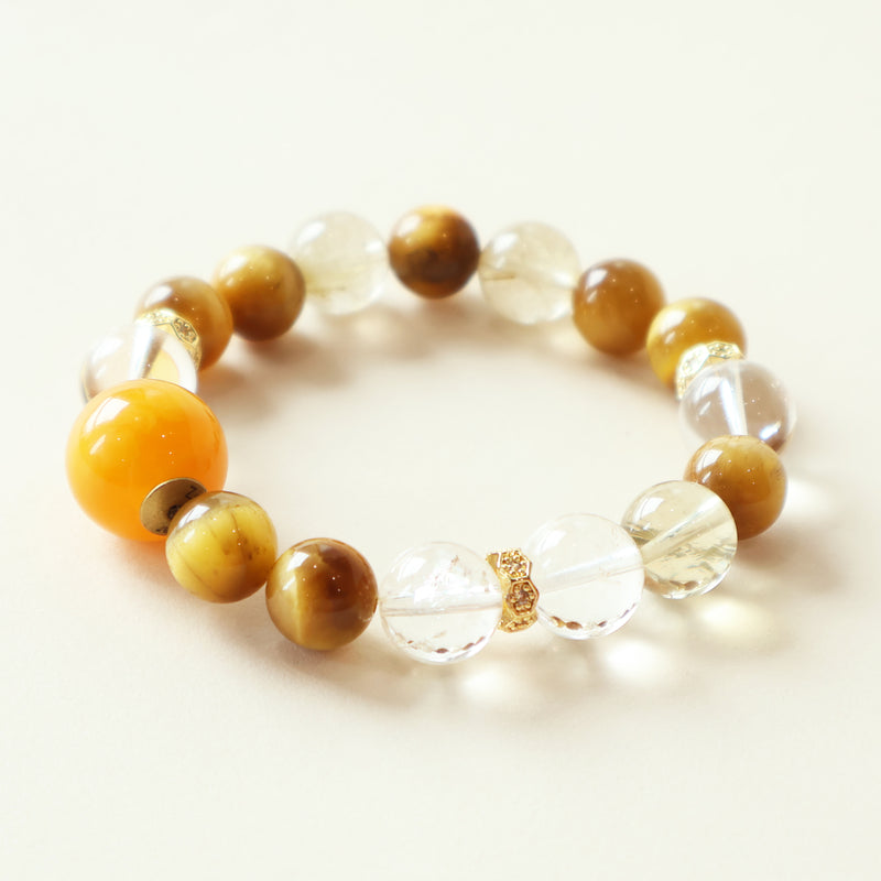 Amber Rise crystal bracelet with Golden Tiger Eye beads, Clear Quartz, Azeztulite, Golden Rutilated Quartz and warm golden crystal design