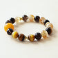 Solar Shield Tiger Eye Smoky Quartz Yellow Tower Crystal bracelet with natural crystal beads and beeswax design