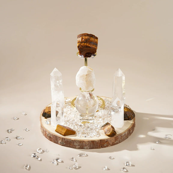 Tiger’s Eye and Clear Quartz crystal grid set with natural wood base