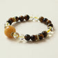 Golden Ray bracelet crafted with Tiger Eye and Citrine crystal beads featuring golden brown tones and natural crystal design