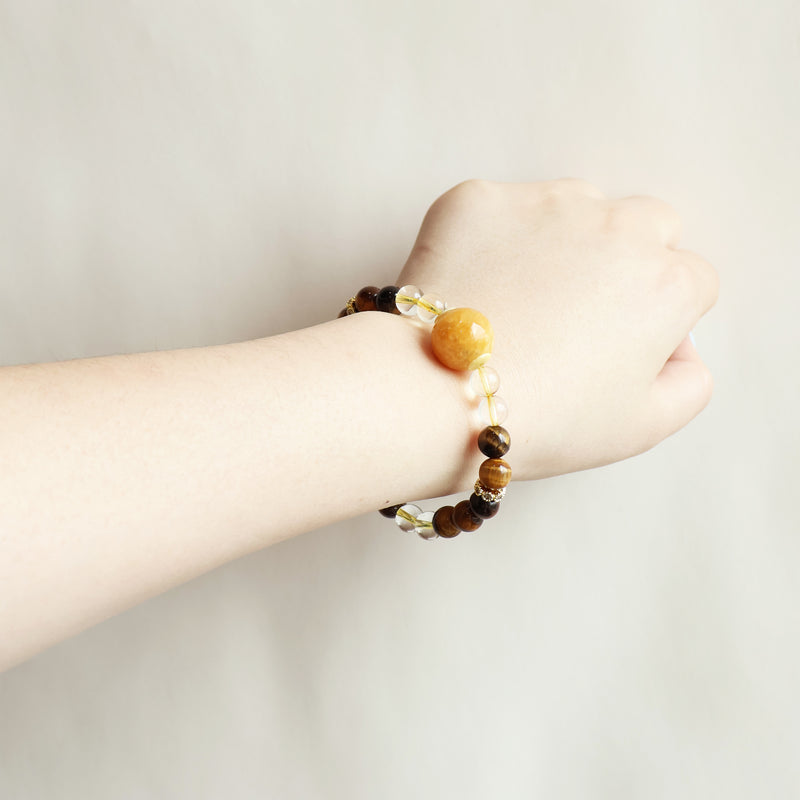 Golden Ray Tiger Eye Citrine bracelet worn on wrist showing warm golden crystal style and everyday jewelry look