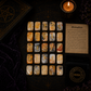 Agate rune stones set for divination with engraved gold symbols and rune pouch