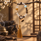Clear quartz and Qinan agarwood bracelet with larimar and tassel