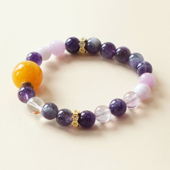 Violet Whisper natural crystal bracelet with Amethyst Spodumene and Clear Quartz beads in elegant purple crystal design