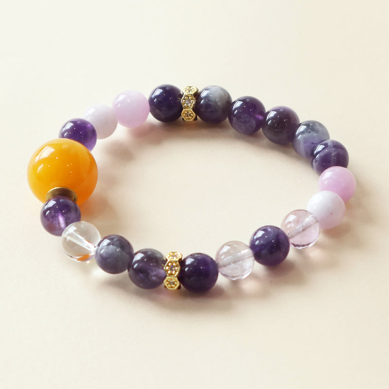 Violet Whisper natural crystal bracelet with Amethyst Spodumene and Clear Quartz beads in elegant purple crystal design