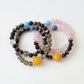Harmony Link couple bracelet set featuring smoky quartz, silver obsidian, rose quartz, kyanite, amazonite and mixed natural crystals