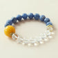 Sky Clarity crystal bracelet crafted with natural Kyanite beads and Clear Quartz in a calming blue and transparent crystal design
