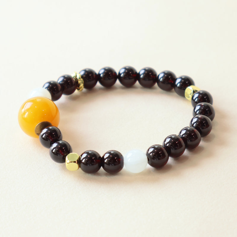 Ember Moon Garnet Moonstone crystal bracelet with natural gemstone beads and minimalist jewelry design