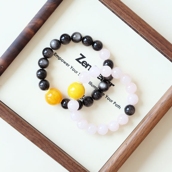 Shadow Bloom matching crystal bracelets for couples displayed with natural Silver Obsidian and Rose Quartz gemstone details