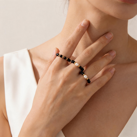 Natural black spinel and freshwater pearl beaded rings worn on hand