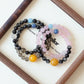 Harmony Link natural crystal couple bracelets displayed in an elegant lifestyle setting with premium handcrafted details