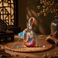 Five Elements crystal wishing bottle charm with multicolor tassel, red bottle and crystal chips