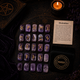 Amethyst crystal rune stones for divination with gold engraved symbols and rune pouch