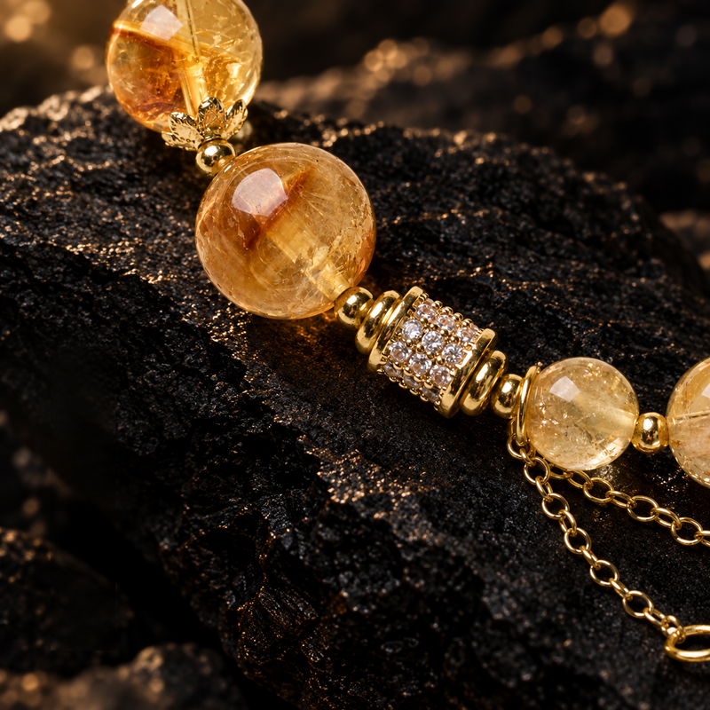 Yellow Azeztulite bracelet with zircon spacers and gold-plated copper details