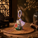 Five Elements crystal wishing bottle charm with purple tassel, green bottle and colorful crystal chips