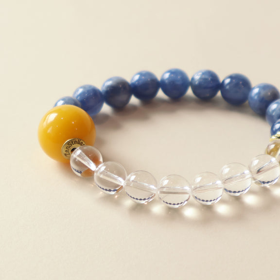 Close up of Sky Clarity bracelet featuring Kyanite texture, Clear Quartz clarity and polished natural crystal bead details