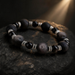 Close-up of meteorite-inspired textured silver sheen obsidian bracelet