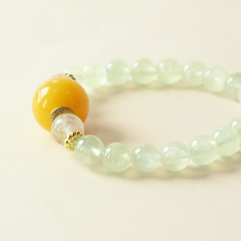 Close up detail of Jade Mist AI Companion Bracelet with Prehnite, Golden Rutilated Quartz and Moonstone beads