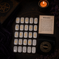 Clear Quartz rune stones set for divination with engraved gold symbols and rune pouch