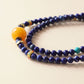 Close up view of Star Dream bracelet highlighting lapis lazuli texture, blue crystal tones and detailed craftsmanship
