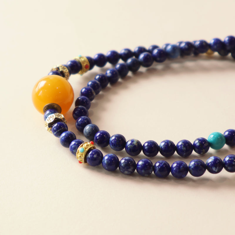 Close up view of Star Dream bracelet highlighting lapis lazuli texture, blue crystal tones and detailed craftsmanship