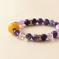 Violet Whisper AI Companion Bracelet detail view showcasing Amethyst Spodumene Clear Quartz beads and natural crystal craftsmanship