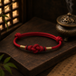 Red Eastern Harmony Ruyi knot cord bracelet with traditional Chinese-inspired detailing