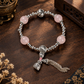 12mm Rose Quartz gemstone tassel bracelet with silver-tone accents