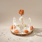 Sunstone and Clear Quartz crystal grid set with natural wood base
