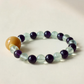 Green Fluorite and Amethyst AI companion bracelet with natural crystal beads
