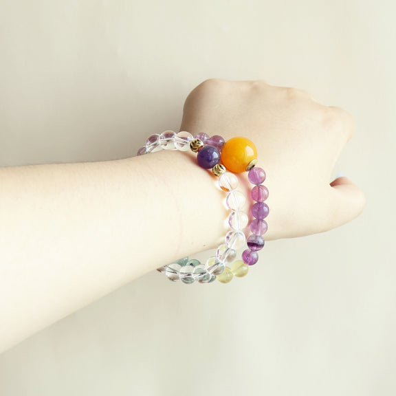 Aurora Dream Fluorite White Crystal Amethyst bracelet worn on wrist showing colorful crystal style and everyday jewelry look