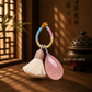 Rose Quartz crystal tassel bag charm with colorful handwoven cord and teardrop stone