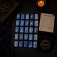 Blue Aventurine rune stones set for divination with engraved gold symbols and rune pouch