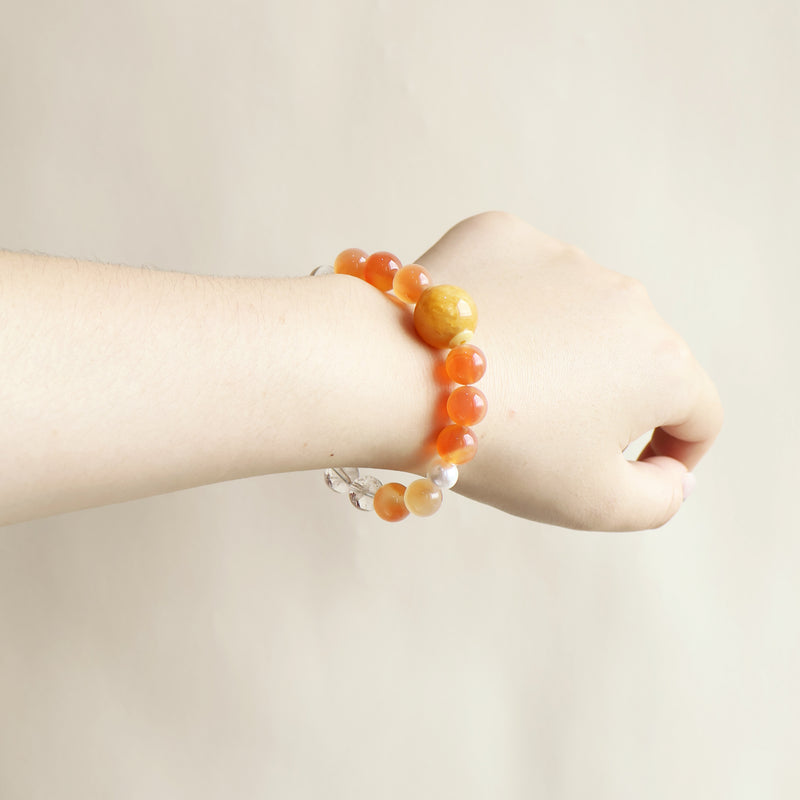 Bloom Aura Cherry Blossom Agate White Azeztulite bracelet worn on wrist showing natural crystal style and everyday jewelry look