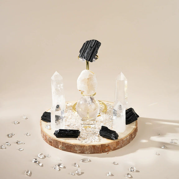 Black Tourmaline and Clear Quartz crystal grid set with natural wood base