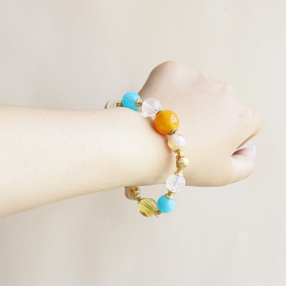 Close up view of Azure Dawn AI Companion Bracelet crafted with Amazonite Yellow Tower Crystal Citrine Clear Quartz Azeztulite and Golden Rutilated Quartz beads
