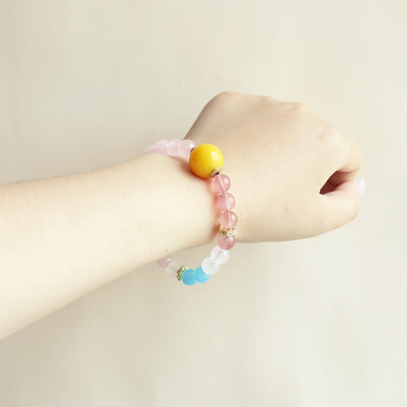Rose Dream crystal bracelet worn on wrist showing soft pink gemstone design and everyday AI companion jewelry style