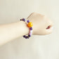 Violet Whisper Amethyst Spodumene Clear Quartz bracelet worn as AI smart crystal jewelry for everyday style