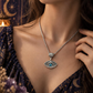 Evil eye pendant necklace worn with a celestial inspired outfit
