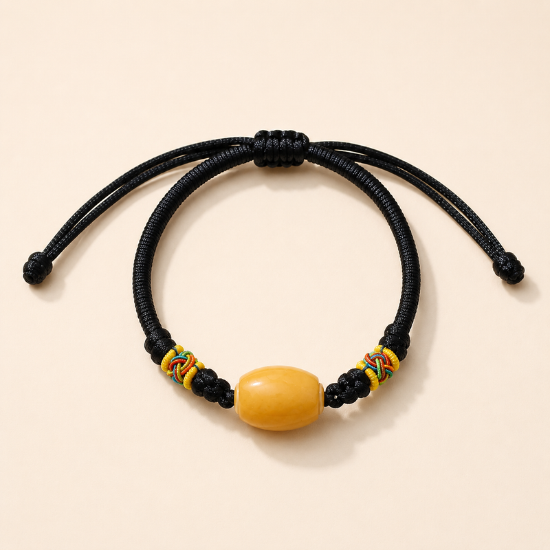 Black adjustable woven cord AI companion bracelet with yellow core bead