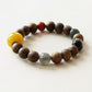 Close-up view of Eastern Wisdom Agarwood Crystal Bracelet showing natural agarwood beads and carefully selected crystal details