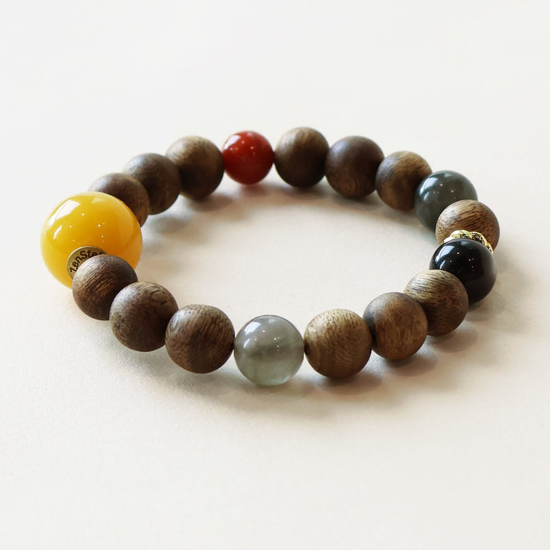 Close-up view of Eastern Wisdom Agarwood Crystal Bracelet showing natural agarwood beads and carefully selected crystal details