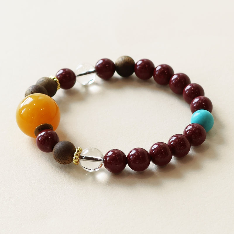 Eastern inspired Agarwood and Cinnabar Bracelet featuring clear quartz beads and turquoise accents