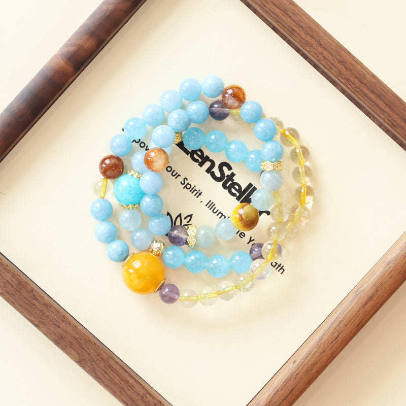 Azure Horizon Promise AI Companion Bracelet displayed with Zenstellar branding, crafted from Aquamarine, Blue Chalcedony, Fluorite, Citrine, Amazonite, Golden Tiger Eye, Yellow Garden Quartz, Rutilated Quartz, Calcite, and NFC crystal technology.