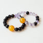 Dusk Whisper couple bracelet set made with natural Gold Obsidian and Purple Rutilated Quartz crystals