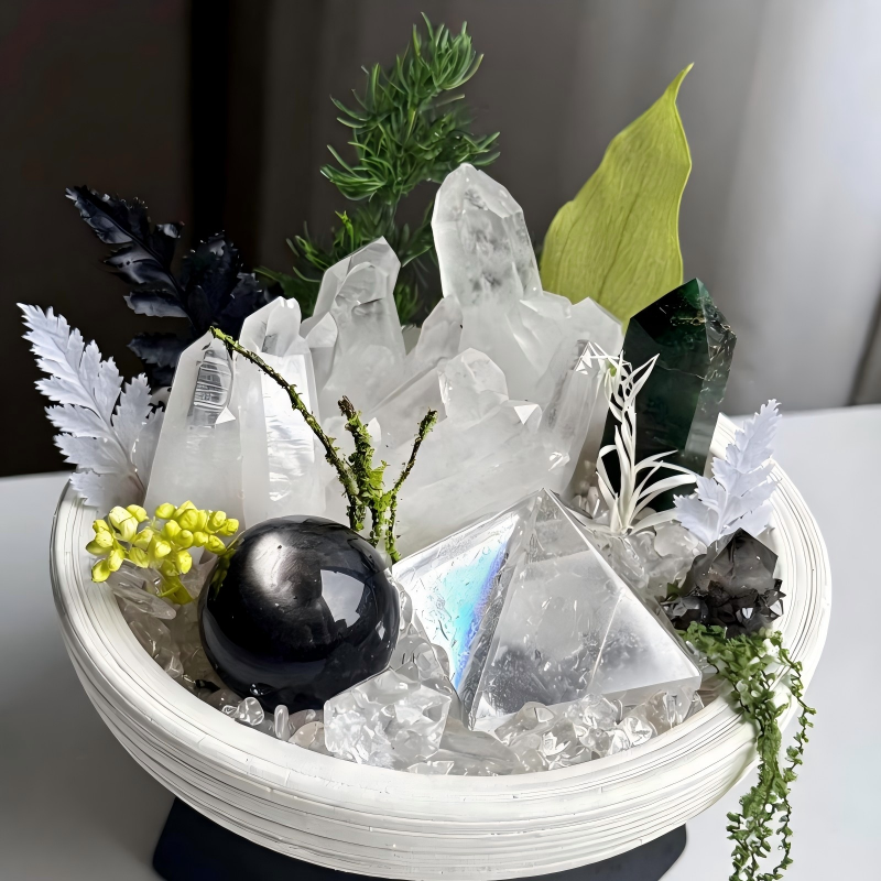 Detailed view of Clear Quartz Clusters, Green Phantom Quartz Tower, Obsidian Sphere, and Smoky Quartz in the Evergreen Sanctuary Crystal Garden