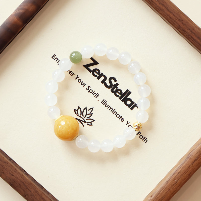 Frost Mist Snow AI Companion Bracelet displayed on Zenstellar presentation card highlighting emotional balance design with White Agate and Hetian Jade gemstones