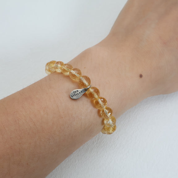 Golden Radiance faceted citrine bracelet worn on the wrist
