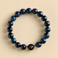 Men's Harmony Link™ personalized Blue Tiger Eye bracelet featuring a custom black initial bead, handcrafted with natural Blue Tiger Eye gemstones.