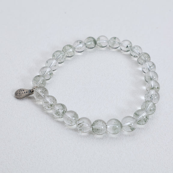 Detail of the 925 sterling silver charm on a green phantom quartz bead bracelet
